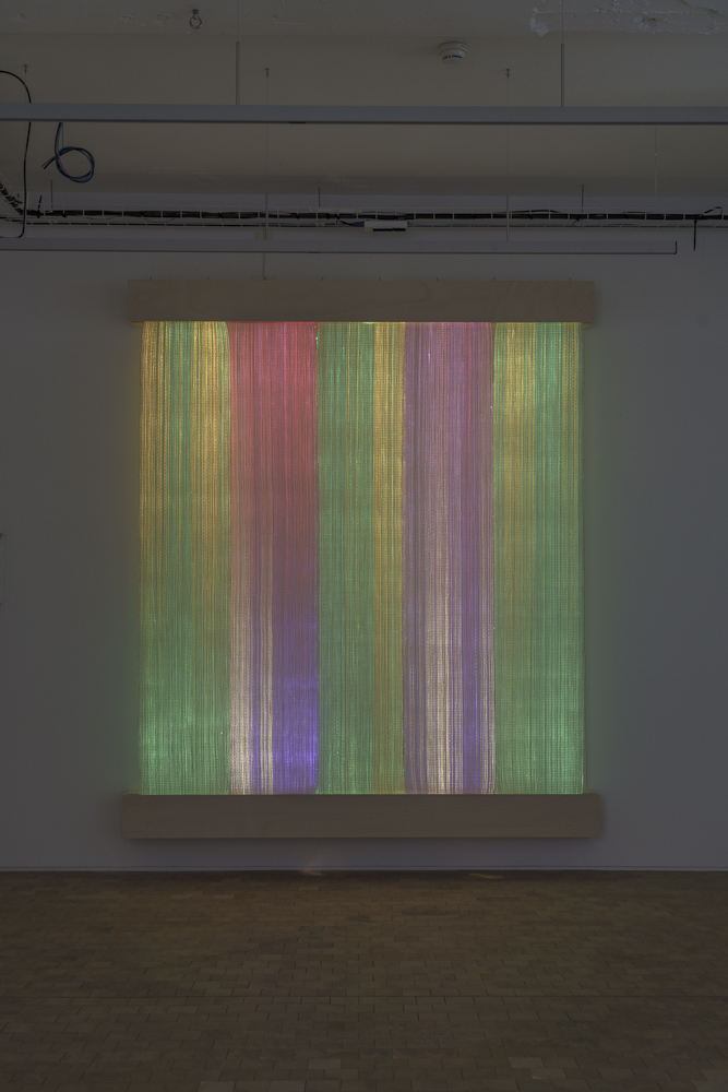 Astrid Krogh. Ikat III. Optic fiber, paper yarn, wood, light monitors. Courtesy of Galerie Maria Wettergren Photo : F. Kleinefenn